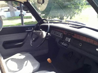 Illustration for article titled For $3,900, Does This 1971 Peugeot 304 Belong Behind Velvet Ropes?